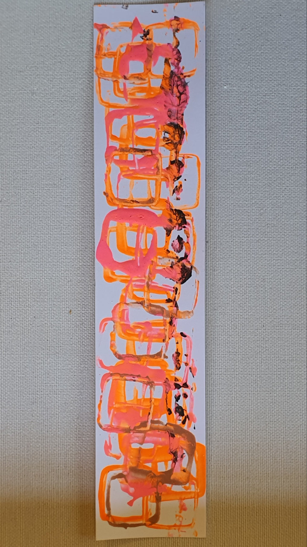 Hand painted paper bookmark with squares print.